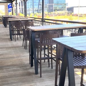 Delta bar height tables and wooden table tops.