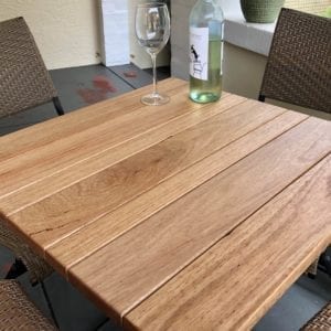 Wooden table tops for outdoor use in restaurants.