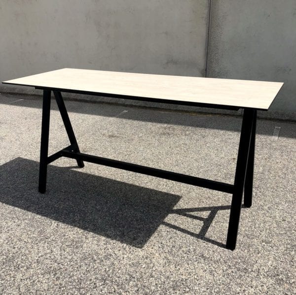 Delta bar table with compact laminate table top.