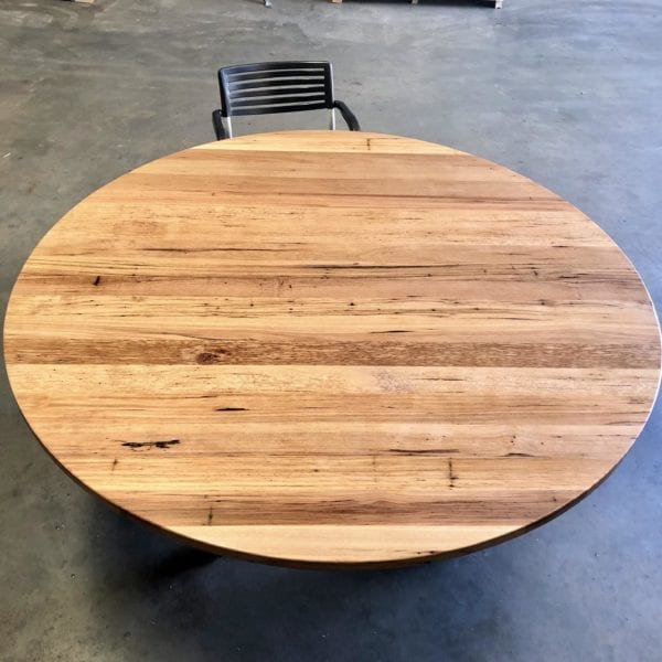 Chestnut hardwood table top, 180cm diameter.