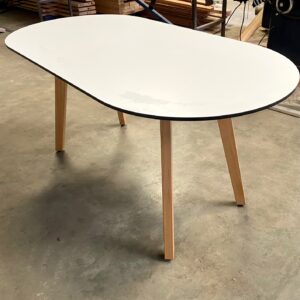 Spirit Table with oval compact laminate top.