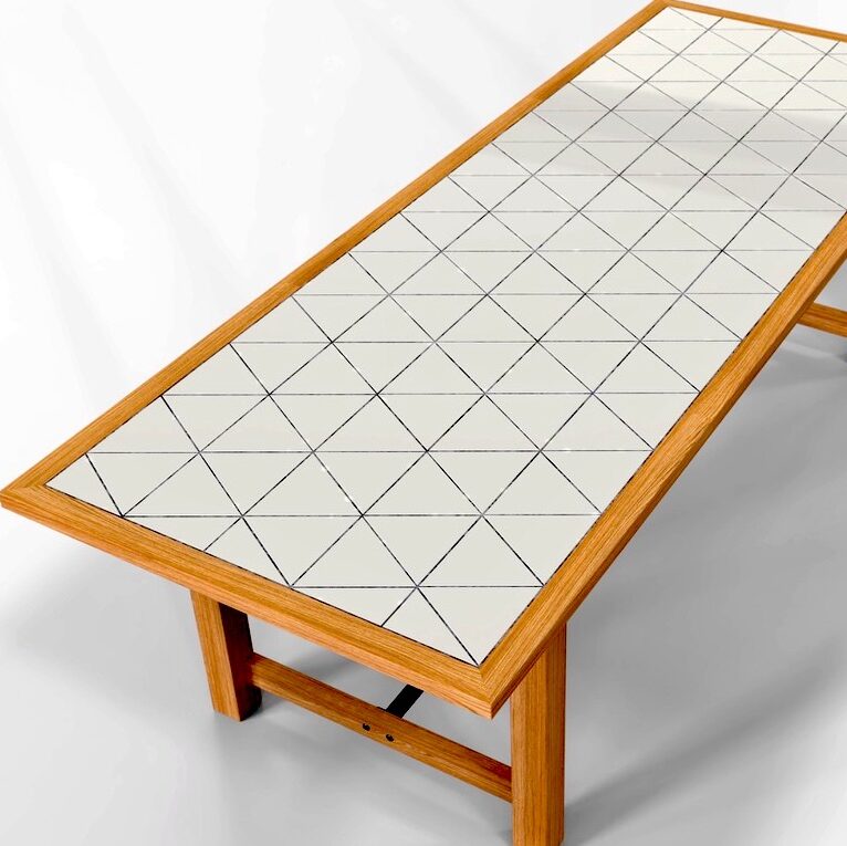 Large tiled table top with wooden edges..